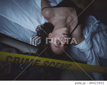 Crime Scene - Woman dead lying on the bed Crime Scene - Woman dead lying on the bed 89423932