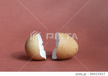 broken egg shell on brown background with space for text broken egg shell on brown background with space for text 89425937