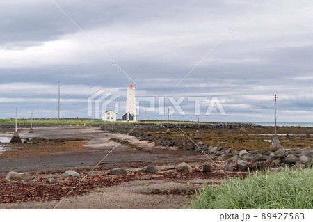 Landscape view with Grotta Island Lighthouse near Reykjavik. Landscape view with Grotta Island Lighthouse near Reykjavik. 89427583