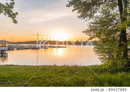 Sunset time at marina on Ukiel lake. 89427880