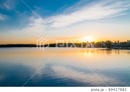 Panoramic view on Ukiel lake at sunset time in Olsztyn. 89427882
