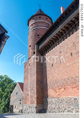 Fortified castle tower of Castle of Warmian Bishops in Olsztyn. 89427919