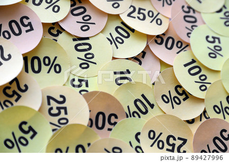 Large amount of stickers with yellow percentage values for black friday or cyber monday sale. Abstract image of discount prices Large amount of stickers with yellow percentage values for black friday or cyber monday sale. Abstract image of discount prices 89427996