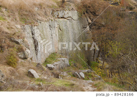 Granite rocks of Bukski Canyon in autumn. Picturesque landscape and beautiful place in Ukraine 89428166