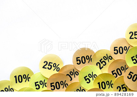Large amount of stickers with yellow percentage values for black friday or cyber monday sale. Abstract image of discount prices 89428169
