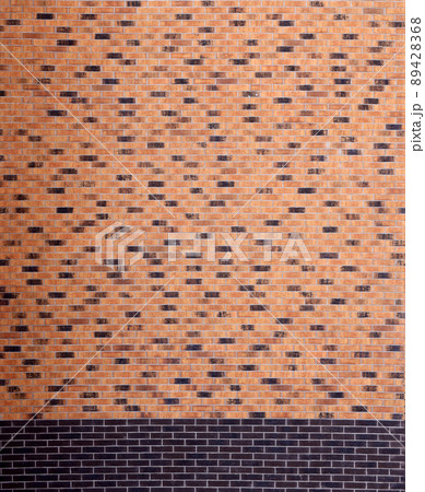 Dark brick wall pattern with chaotic masonry order. Background texture or resource for 3d texturing. Many bricks in big modern stone wall Dark brick wall pattern with chaotic masonry order. Background texture or resource for 3d texturing. Many bricks in big modern stone wall 89428368
