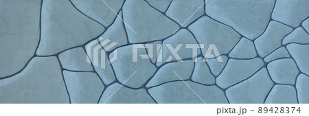 pattern of ancient style design decorative uneven cracked real stone wall surface with cement. Old sacred tomb facade with sunlight pattern of ancient style design decorative uneven cracked real stone wall surface with cement. Old sacred tomb facade with sunlight 89428374