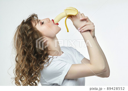 attractive girl with red lipstick shoved a banana deep into her mouth attractive girl with red lipstick shoved a banana deep into her mouth 89428552