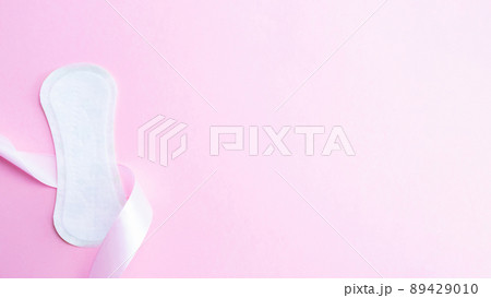 Feminine hygiene menstrual pads. Menstruation napkin for woman hygiene on pink background. Menstruation feminine period. Menstruation, critical days, zero waste, eco, ecology banner. Feminine hygiene menstrual pads. Menstruation napkin for woman hygiene on pink background. Menstruation feminine period. Menstruation, critical days, zero waste, eco, ecology banner. 89429010