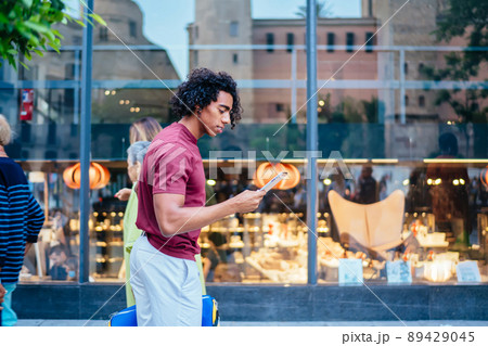 Millennial hipster guy with digital tablet messaging 89429045