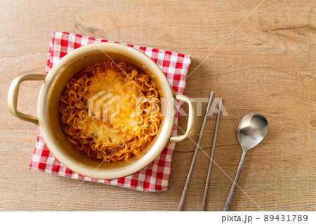 Korean spicy instant noodle with cheese 89431789