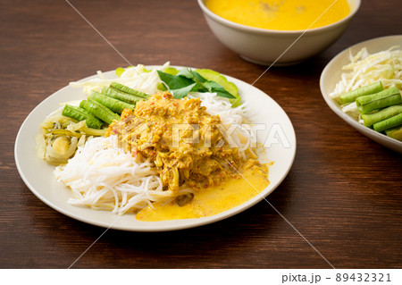 Thai Rice Noodles with Crab Curry and Variety Vegetables Thai Rice Noodles with Crab Curry and Variety Vegetables 89432321