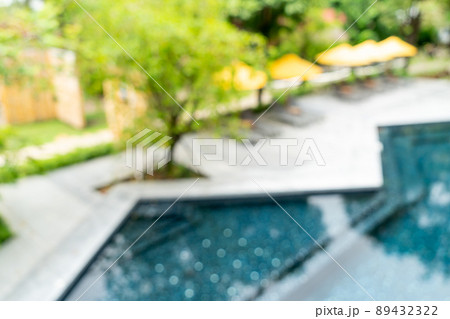 umbrella and pool bed around swimming pool umbrella and pool bed around swimming pool 89432322