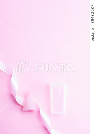 Menstrual cycle sanitary cup. Pink ribbon with menstrual cup. Menstruation feminine period. Sanitary hygiene banner. Use menstrual cup inside vagina. Menstrual cycle sanitary cup. Pink ribbon with menstrual cup. Menstruation feminine period. Sanitary hygiene banner. Use menstrual cup inside vagina. 89432637