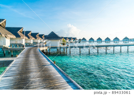 Beautiful tropical Maldives resort hotel and island with beach and sea 89433061
