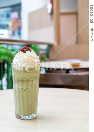 matcha green tea latte blended with whipped cream and red bean matcha green tea latte blended with whipped cream and red bean 89433603