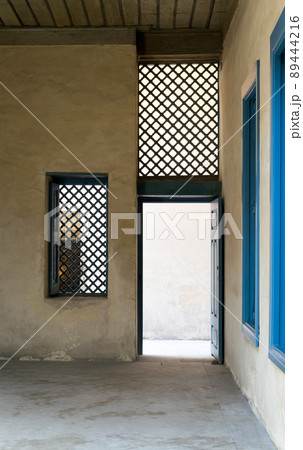 Blue vintage wooden window and blue wooden door 89444216