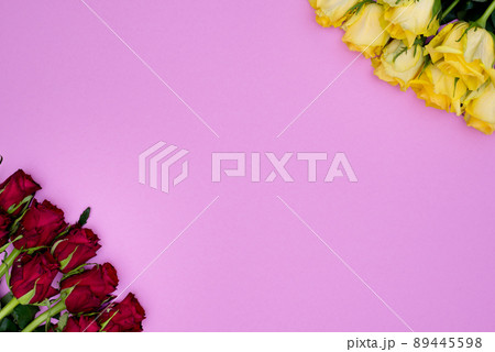Cute Pink background with diagonal corners from red roses and yellow roses. With large copy space ready for design, banners, blanks and posters. Cute Pink background with diagonal corners from red roses and yellow roses. With large copy space ready for design, banners, blanks and posters. 89445598