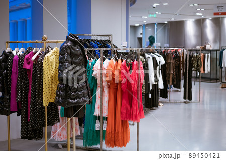 Women's clothing hanging in the store Women's clothing hanging in the store 89450421
