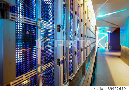 LED pattern system on the mirror glass wall from inside the building to outside with escalator. 89452659