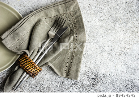 Table setting on concrete background Table setting on concrete background 89454545