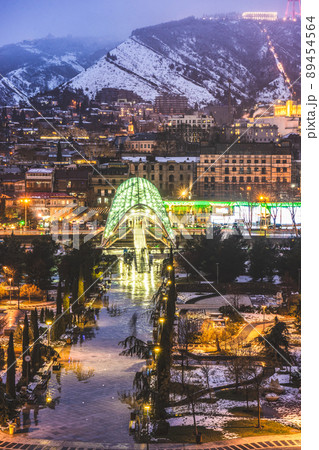 Snowing in Tbilisi city in the evening 89454564