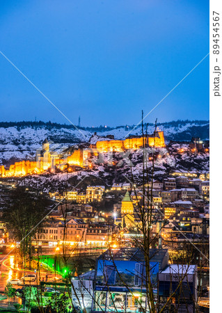 Snowing in Tbilisi city in the evening 89454567