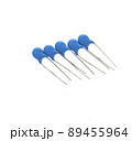 Ceramic capacitors isolated on white background 89455964