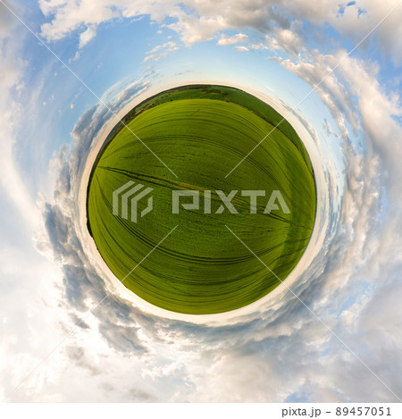 Little planet with green cultivated agricultural fields with growing crops on bright summer day. Little planet with green cultivated agricultural fields with growing crops on bright summer day. 89457051