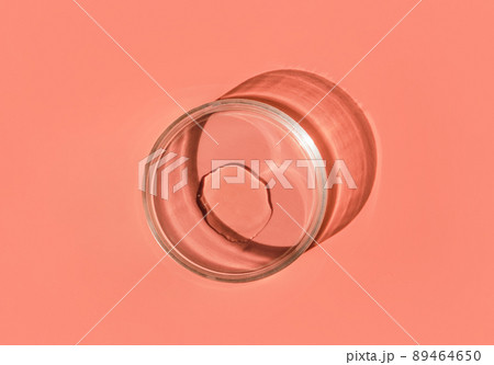 Laboratory glass petri dish for water, serum, oil, beauty product presentation. Natural medicine, cosmetic research, bio science. Concept of skincare and analysis. Dermatology. Flat lay, top view 89464650
