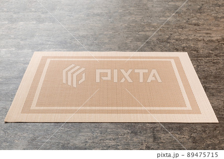 Perspective view of brown tablecloth for food on cement background. Empty space for your design 89475715