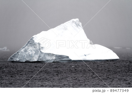 Antarctica - Non Tabular Iceberg - Global warming Antarctica - Non Tabular Iceberg - Global warming 89477349