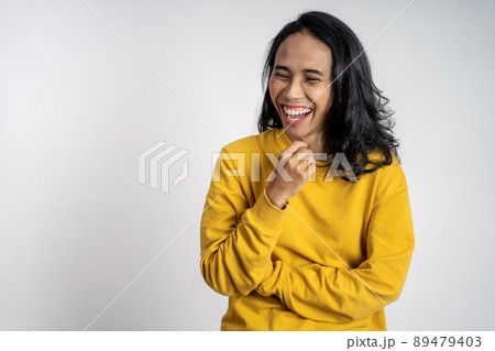 excited beautiful woman feeling joy laughing on isolated background 89479403