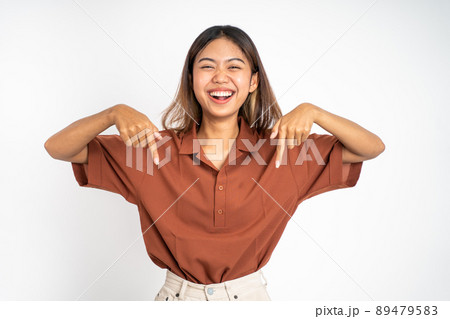 woman with finger pointing down hand gesture on isolated 89479583