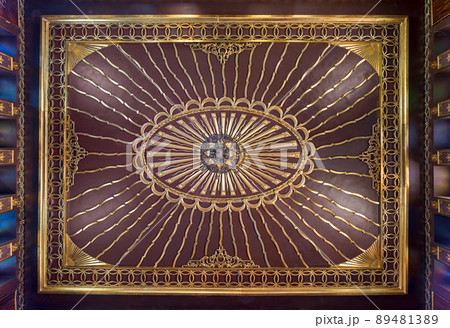 Wooden golden ornate ceiling with design based on sun rays inspired by the old flag of the ottoman empire, Cairo, Egypt Wooden golden ornate ceiling with design based on sun rays inspired by the old flag of the ottoman empire, Cairo, Egypt 89481389