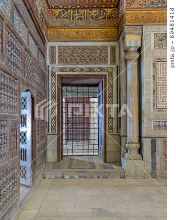 Interior view of decorated marble walls surrounding the cenotaph in the mausoleum of Sultan Qalawun, part of Sultan Qalawun Complex located in Al Moez Street, Old Cairo, Egypt Interior view of decorated marble walls surrounding the cenotaph in the mausoleum of Sultan Qalawun, part of Sultan Qalawun Complex located in Al Moez Street, Old Cairo, Egypt 89481418