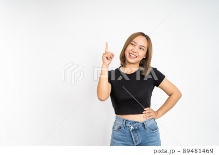 woman with finger pointing up hand gesture on isolated background woman with finger pointing up hand gesture on isolated background 89481469