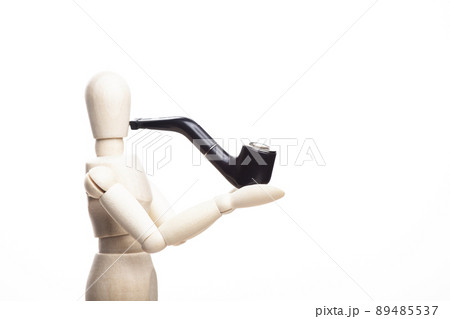 image of wooden figure smoking pipe white background  89485537