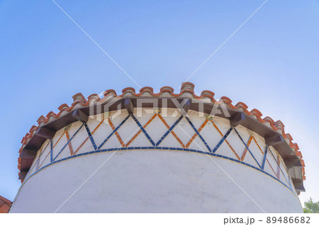 Low angle view of a curved wall with orange and blue trims in San Francisco, California Low angle view of a curved wall with orange and blue trims in San Francisco, California 89486682