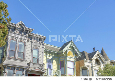 Townhouse exterior in a low angle view with gable roofs in San Francisco, California 89486990