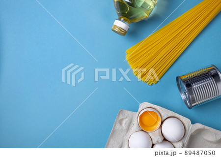 Food shortage, eggs, butter, wheat, pasta. Healthy food set.Basic necessities, rise in price due to sanctions and embargoes on wheat and flour Food shortage, eggs, butter, wheat, pasta. Healthy food set.Basic necessities, rise in price due to sanctions and embargoes on wheat and flour 89487050