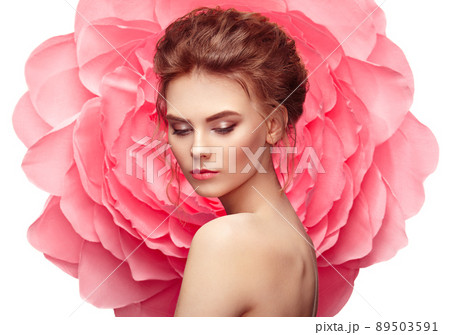 Beautiful woman on the background of a large flower Beautiful woman on the background of a large flower 89503591