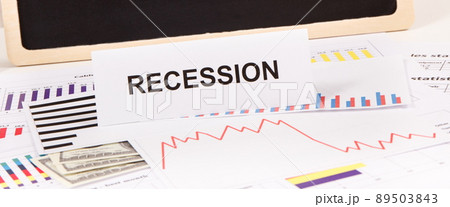 Currencies dollar and downward graphs representing financial crisis caused by coronavirus 89503843