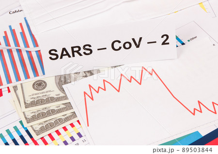 Currencies dollar with downward graphs representing financial crisis caused by coronavirus. Covid-19 Currencies dollar with downward graphs representing financial crisis caused by coronavirus. Covid-19 89503844