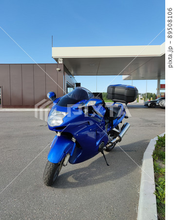 Motorcycle at gas station 89508106
