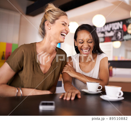 You crack me up. Shot of two friends hanging out at a coffee shop together. You crack me up. Shot of two friends hanging out at a coffee shop together. 89510882