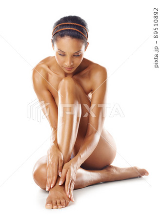 Beauty from head to toe. Studio shot of a young woman with gorgeous skin isolated on white. Beauty from head to toe. Studio shot of a young woman with gorgeous skin isolated on white. 89510892