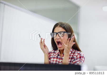 I dont have the patience for this. Shot of a young designer shouting. I dont have the patience for this. Shot of a young designer shouting. 89511013