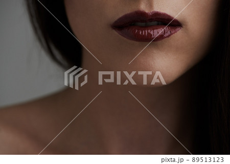 Perfect pout. Cropped beauty portrait of a young womans lips. Perfect pout. Cropped beauty portrait of a young womans lips. 89513123