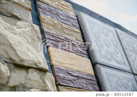 Paving slabs of different colors and shapes.Texture of different colored patterned paving slabs . Modern road surface. Paving slabs of different colors and shapes.Texture of different colored patterned paving slabs . Modern road surface. 89513587